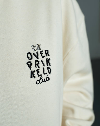 Hoodie ‘De Overprikkeld Club’ - Beige Unisex 85% Biologisch Katoen (Fair Wear)