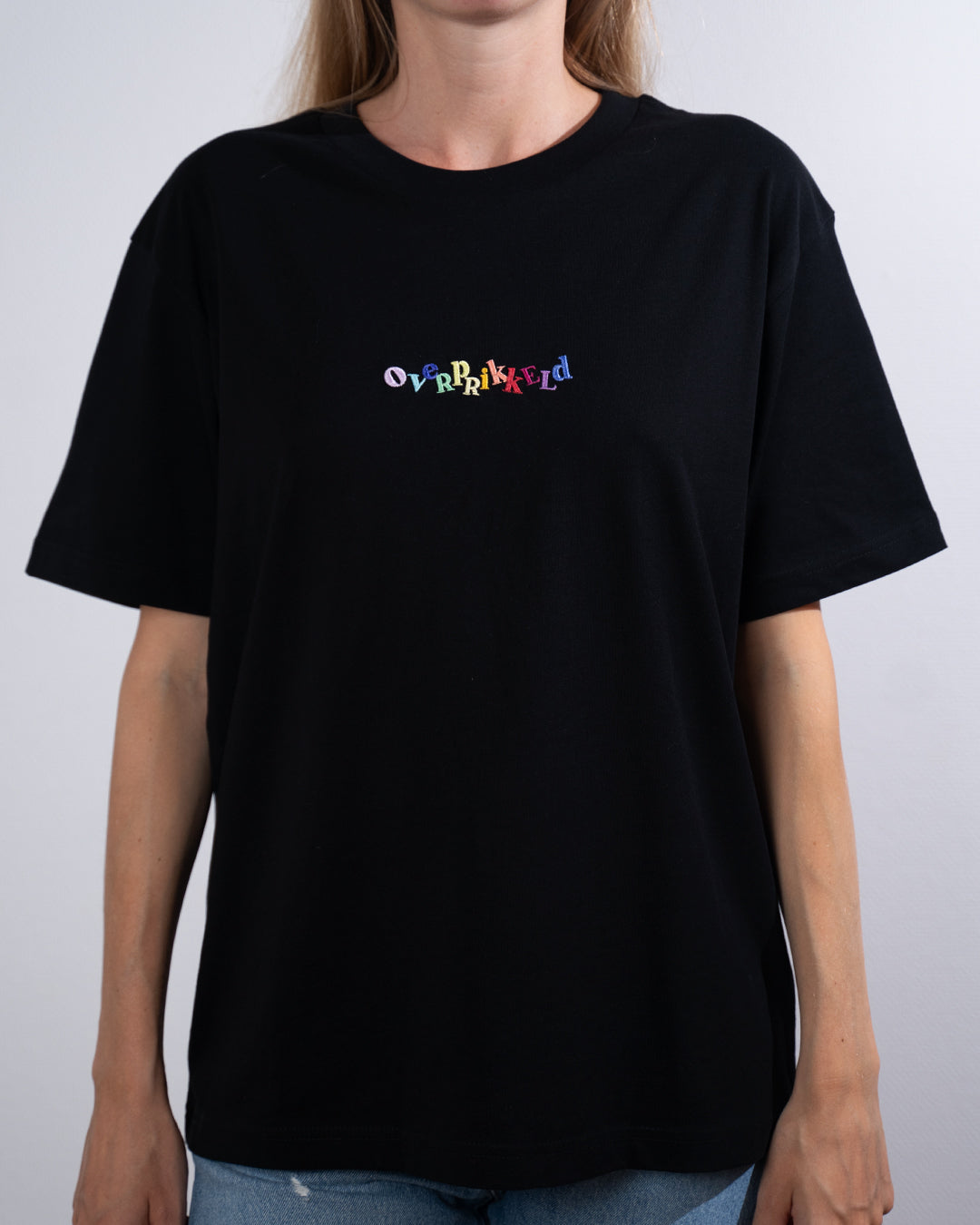 T-shirt Overprikkeld Regenboog - Zwart Relaxed Fit